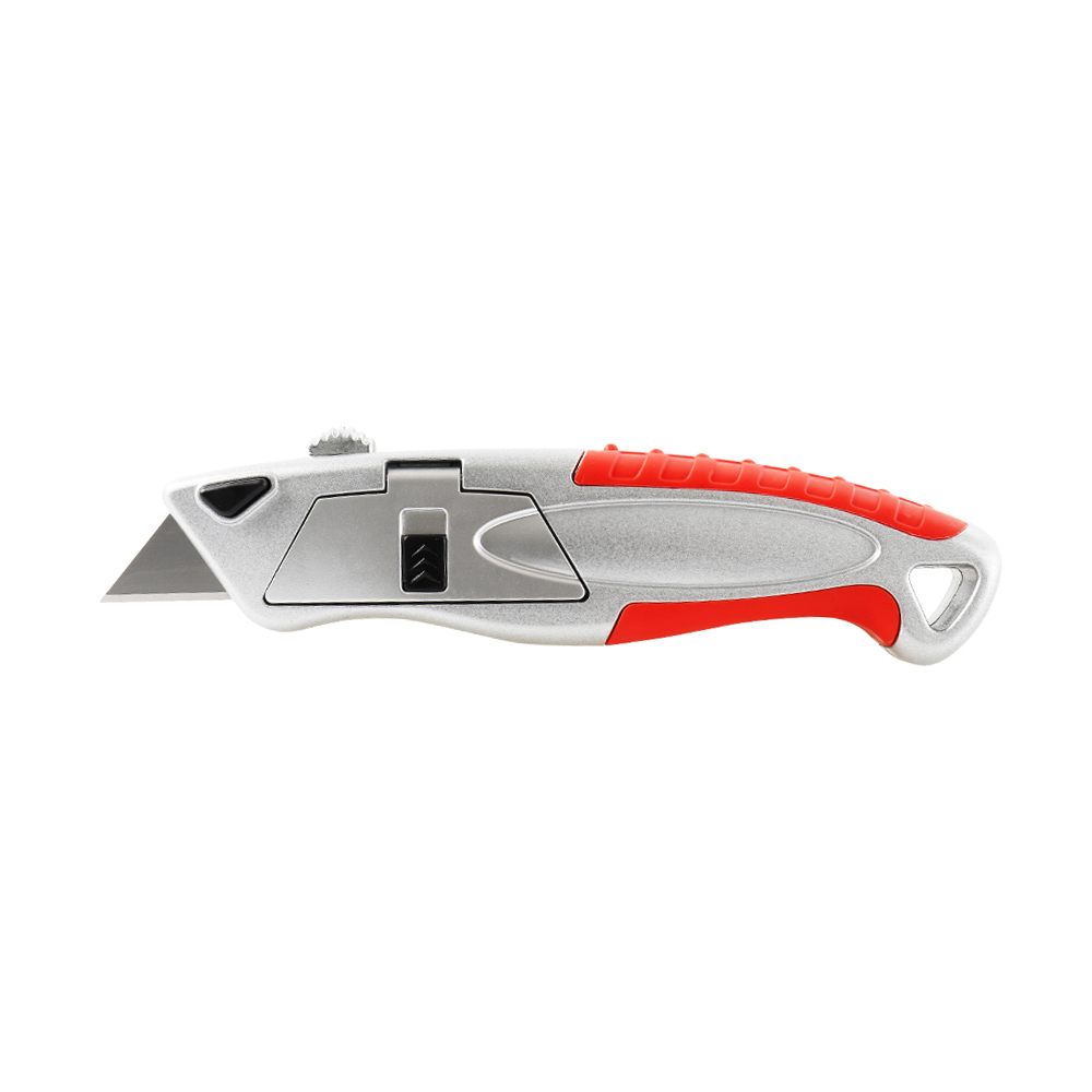 Retractable utility knife with a silver body and red grip, blade extended for cutting into a box or material