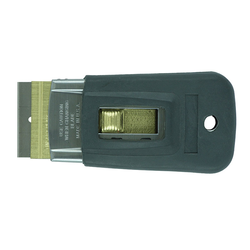 Retractable utility knife with a dark gray handle and a partially extended metal blade, designed to cut cardboard or film.