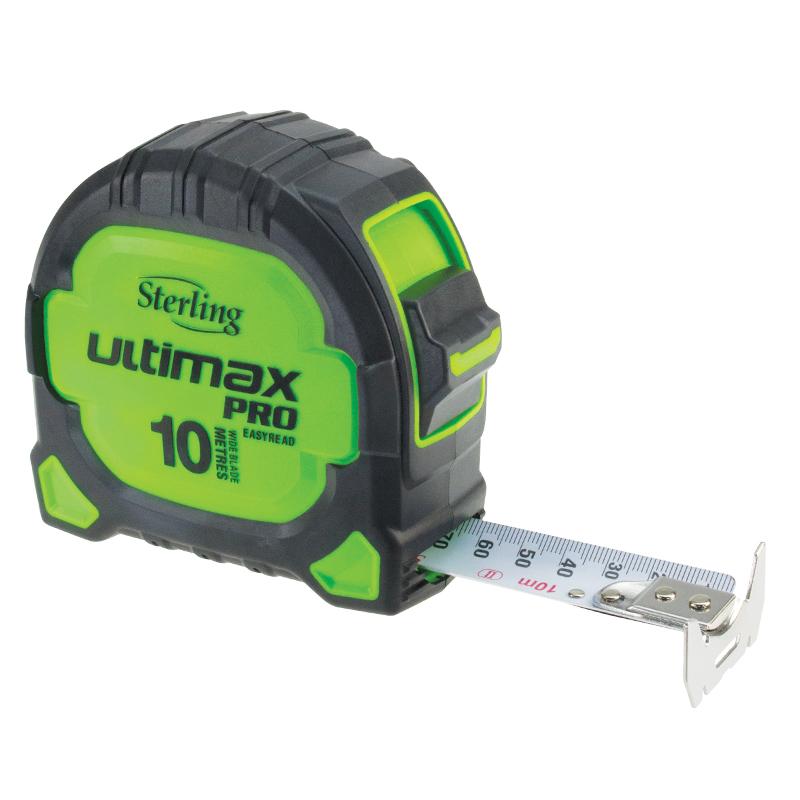 Green and black Sterling Ultimax Pro 10m tape measure with metal ruler extended from the case used for measuring lengths.