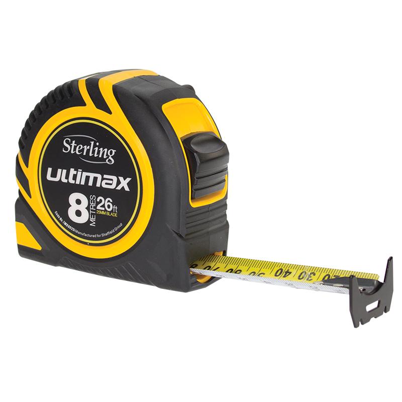 Casual close-up of a Sterling Ultimax retractable tape measure in yellow and black, blade extended with a metal hook visible.